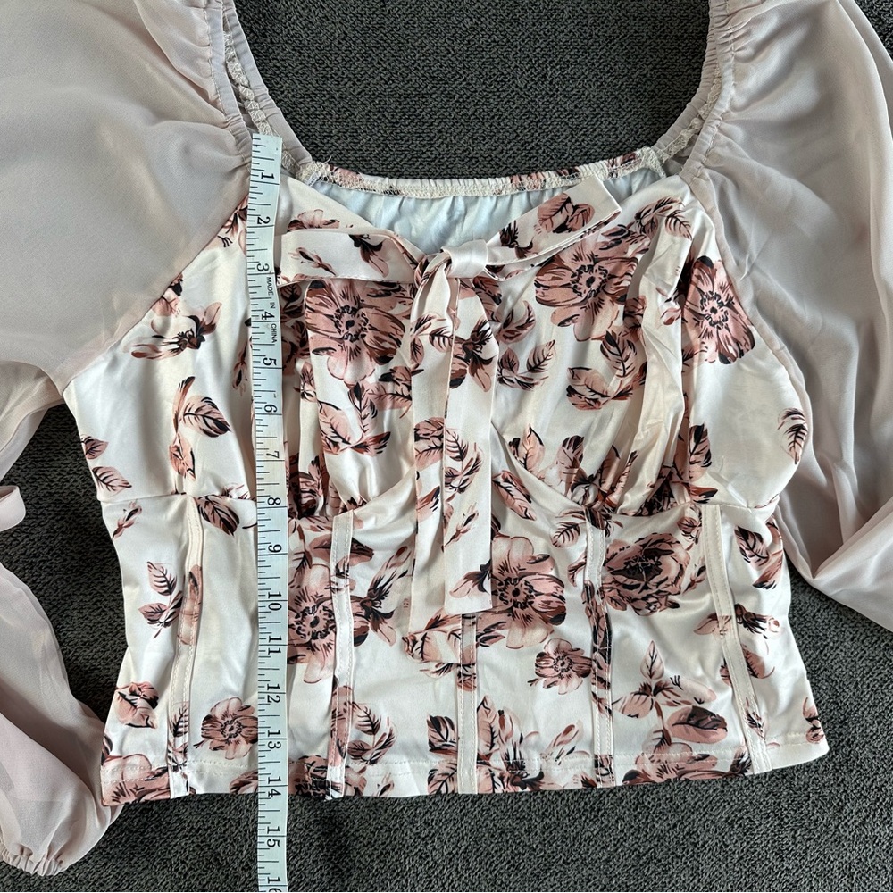 White blouse with square neck puff sleeves and fitted bustier style